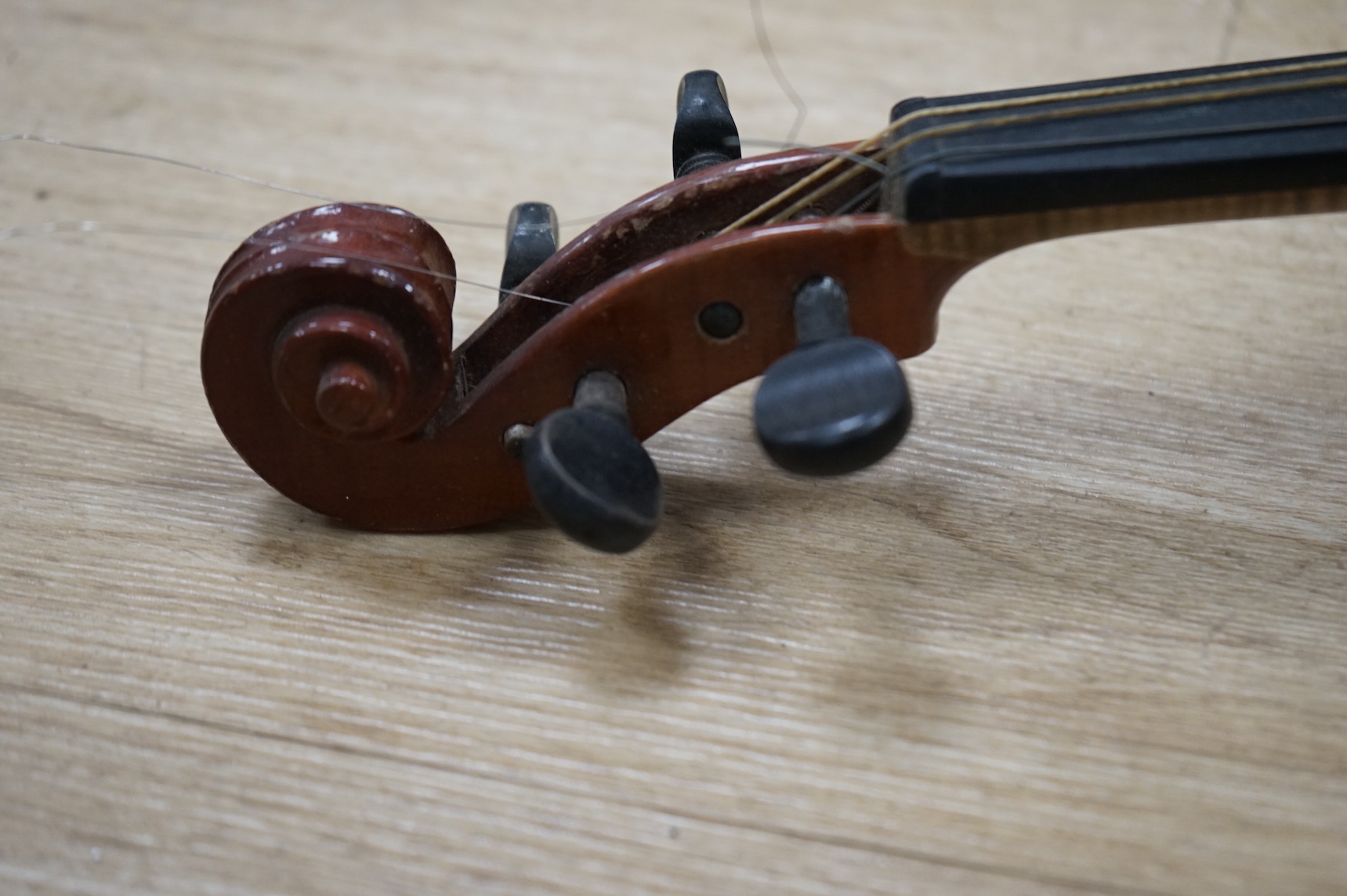 An early 20th century German violin, bearing a Stradivarius label, with case.